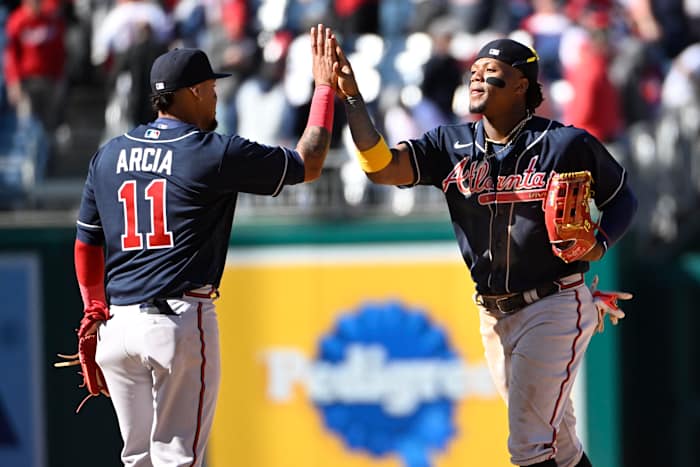 Mar 30, 2023; Washington, District of Columbia, USA; Atlanta Braves right fielder Ronald Acuna Jr. (13) and Atlanta Braves second baseman Orlando Arcia (11) celebrate after the game against the Washington Nationals at Nationals Park. Mandatory Credit: Brad Mills-USA TODAY Sports